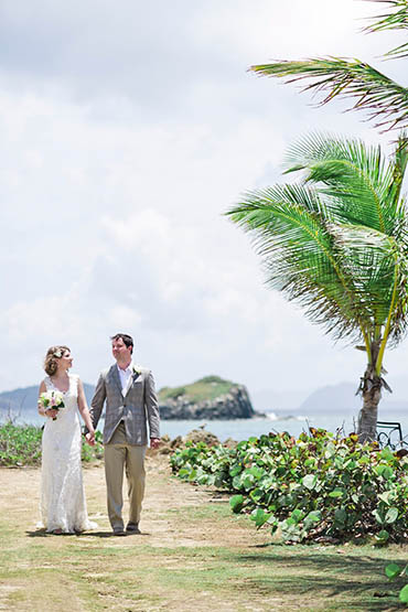 Wedding couple holding hands in the most romantic place in the world.