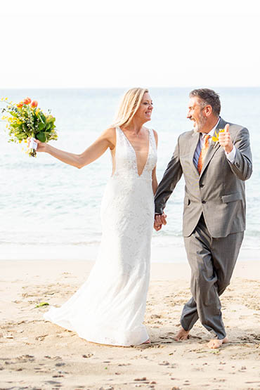 Happily wedded couple renewing their vows on a beach in St Thomas.