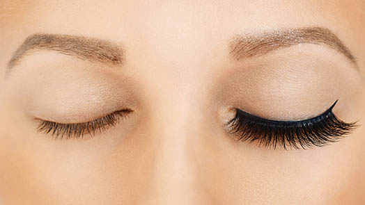 Dramatic before and after difference of fake eyelashes.