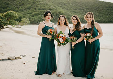Amanda & Josh - Maho Beach Ceremony, Villa Kalorama Reception 011 Loving couple kissing on a palm tree overhanging the water in St. Thomas USVI.