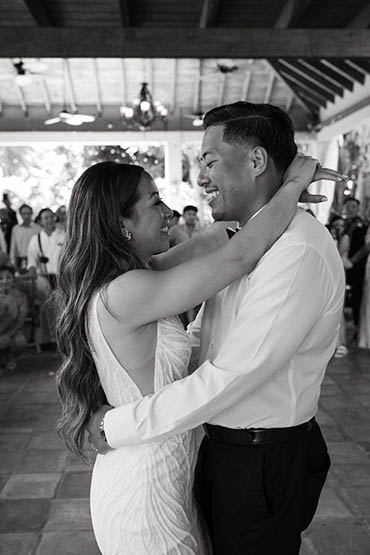 Wedding couple in front of colorful mural in St. Thomas US Virgin Islands.