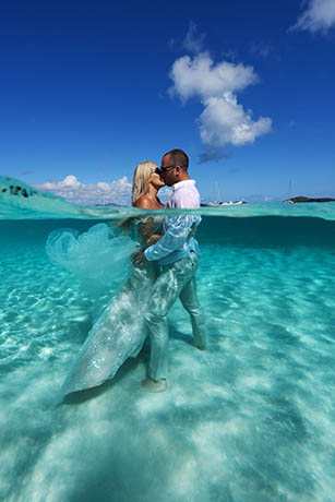 Marriage vow renewals barefoot on St Thomas USVI beach.