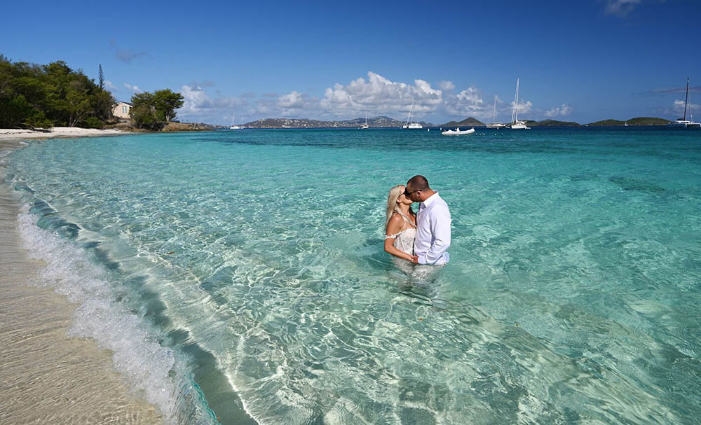 Family together on a beautiful beach for vow renewal ceremony in USVI.