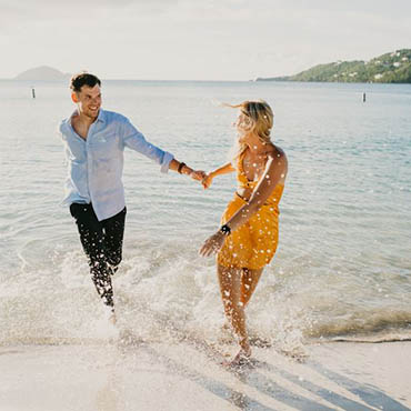 Marriage vow renewals barefoot on St Thomas USVI beach.