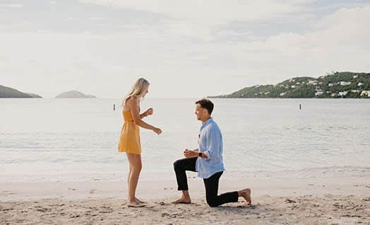 Wedding couple in front of colorful mural in St. Thomas US Virgin Islands.