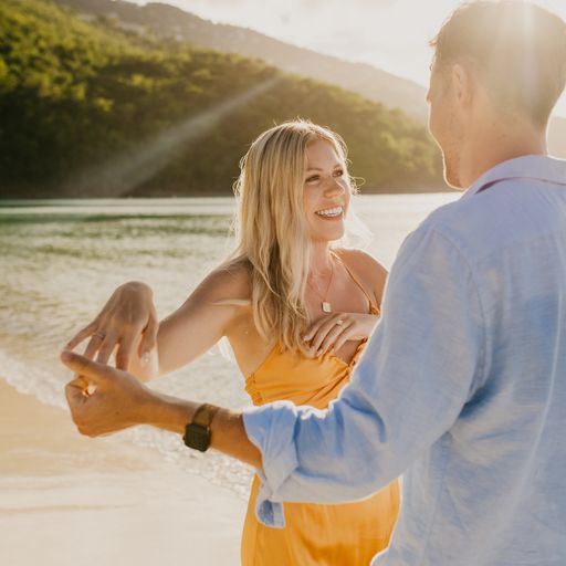 Wedding couple in front of colorful mural in St. Thomas US Virgin Islands.