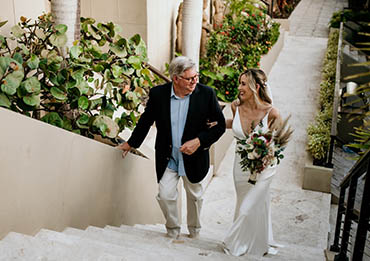 Vow renewal ceremony with kids on a tropical beach in St. Thomas US Virgin Islands.