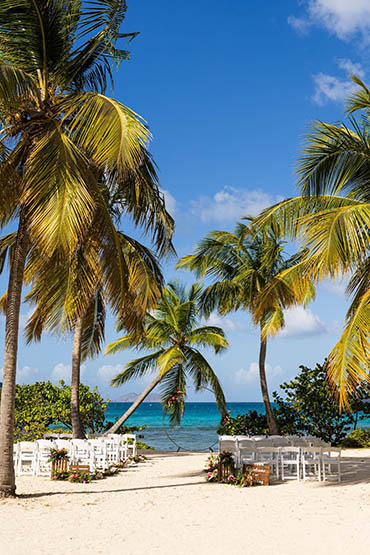 Marriage vow renewals barefoot on St Thomas USVI beach.