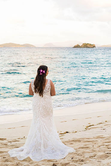 Happily wedded couple renewing their vows on a beach in St Thomas.